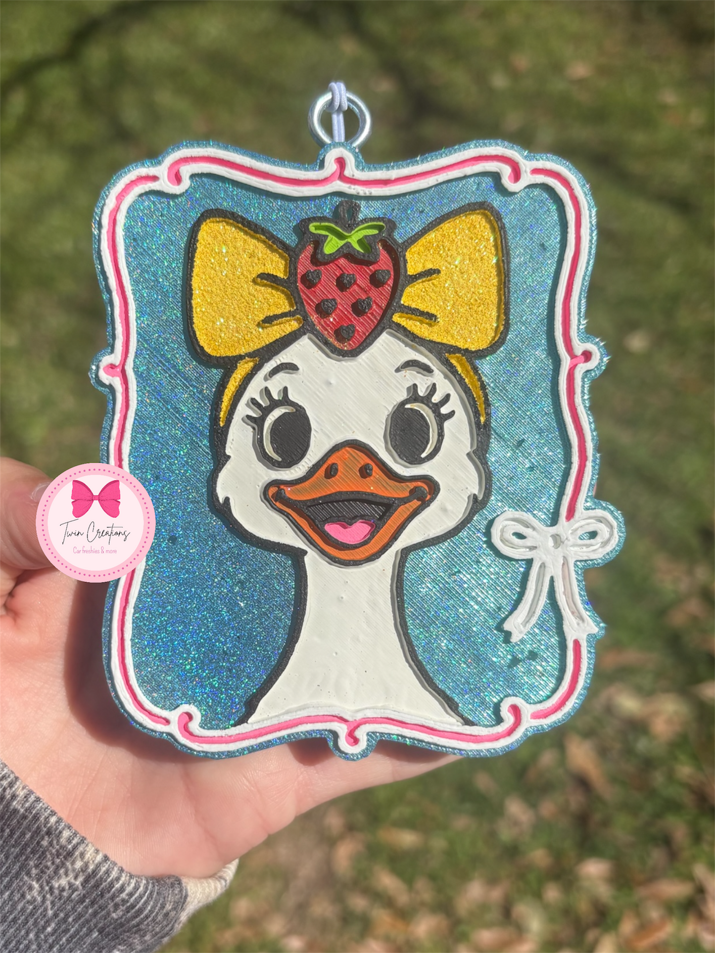 Goose with strawberry bow