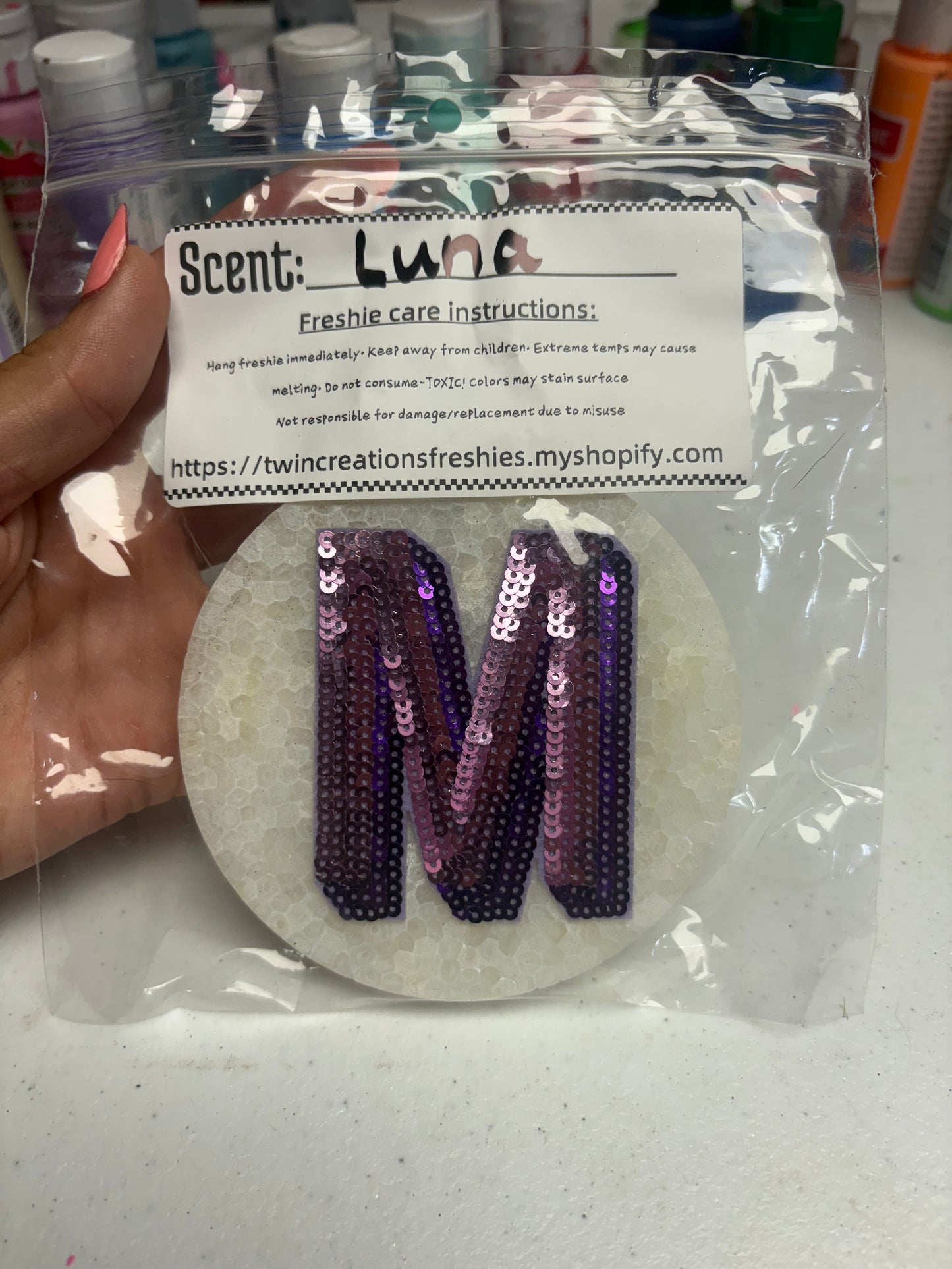 Purple m round in Luna