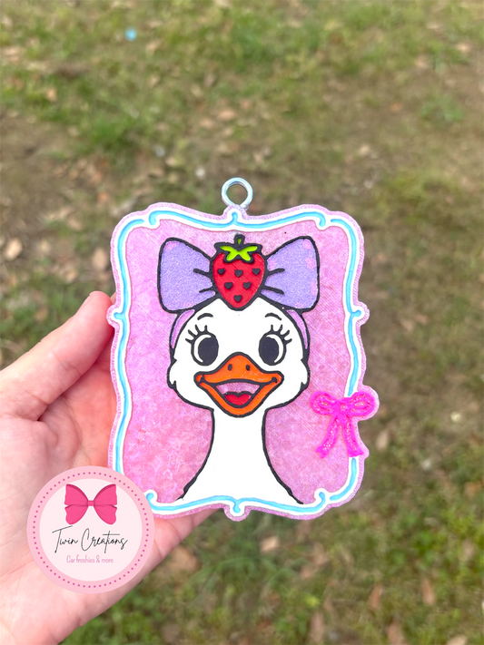 Goose with strawberry bow